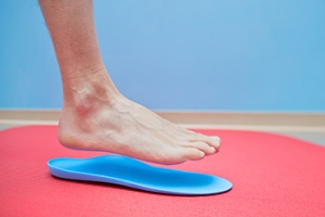 Reducing Risks of Standing All Day with Custom Orthotics